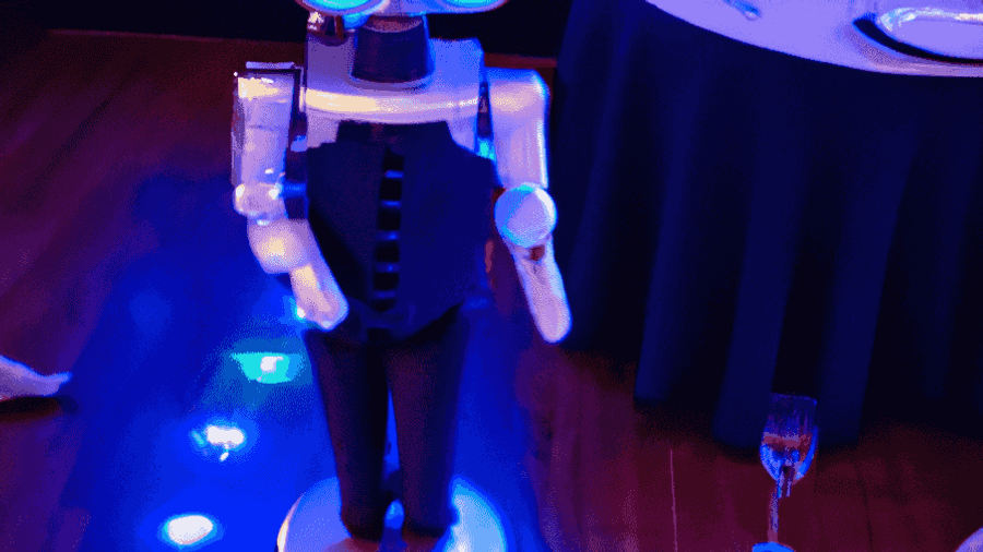 An image of a robot at a party, attempting to socialize with humans and appear as natural as possible.